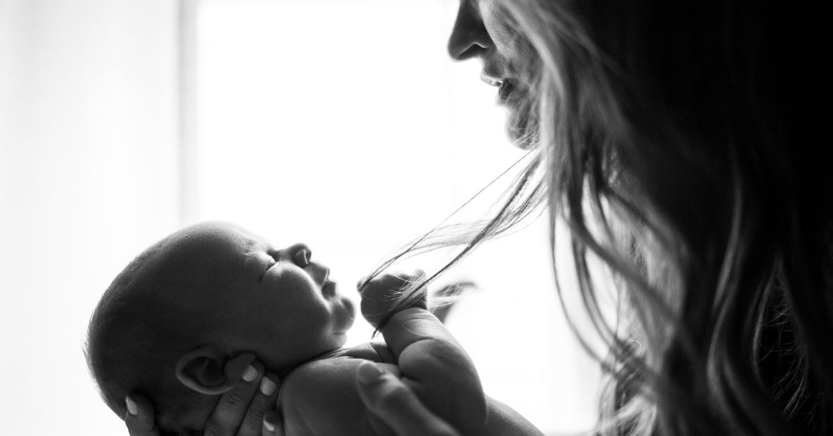 Woman with newborn baby