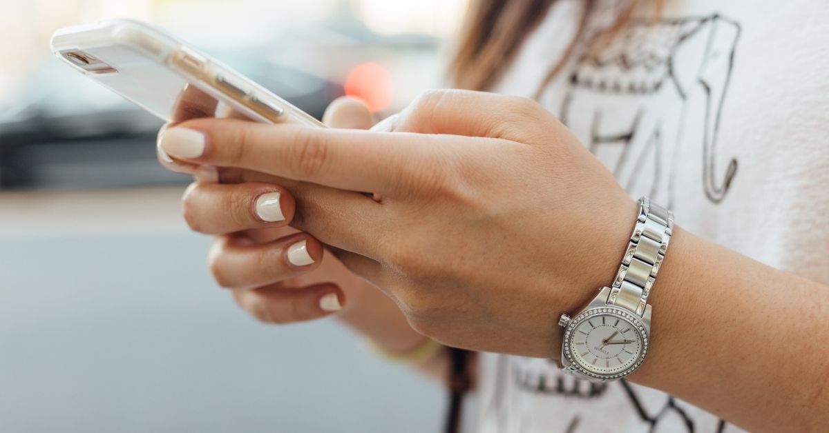 woman looking at phone
